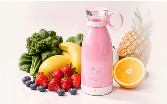 Pink 'Fresh Juice' bottle surrounded by fruits on a white background